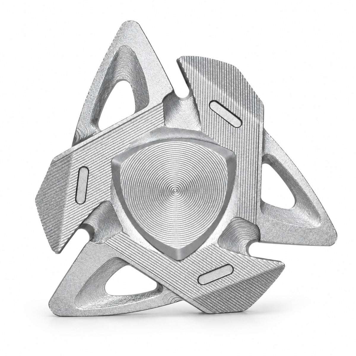 Silver shark fin aluminum alloy fidget spinner on white studio background
