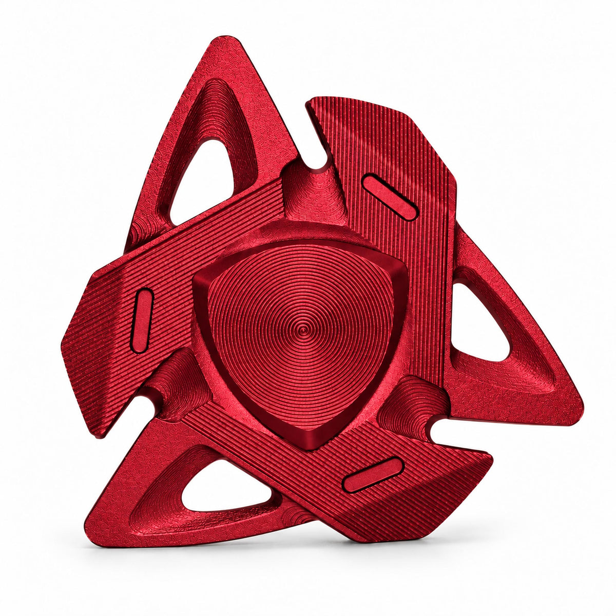 Anodized red shark fin aluminum desk fidget spinner on white backdrop