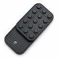 Matte black studded metal fidget slider top view on clean white backdrop