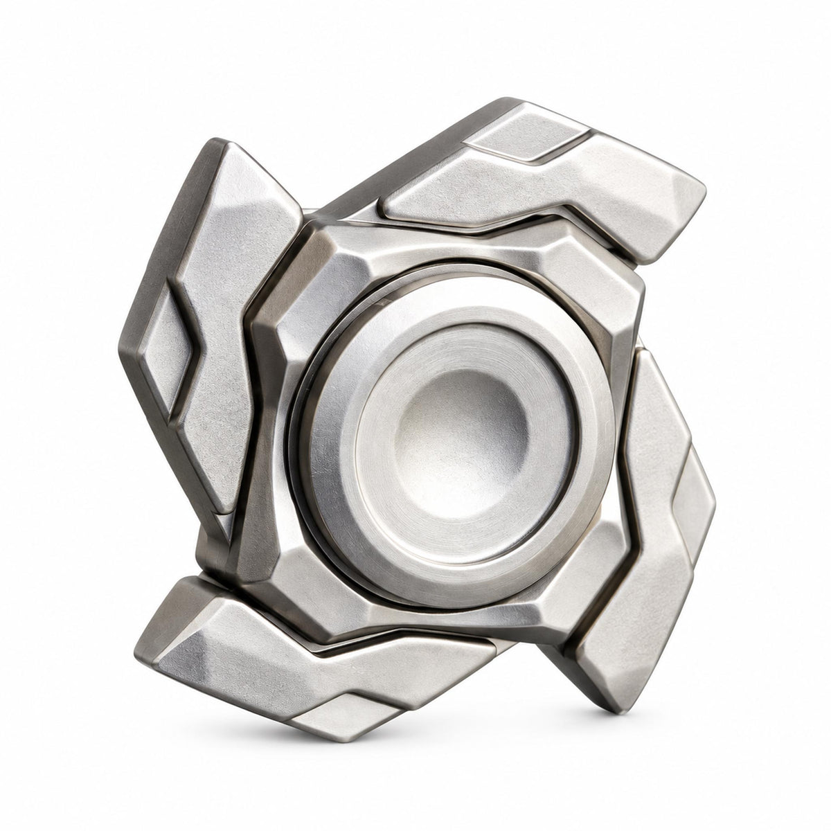 Silver transforming metal fidget spinner in folded compact mode on white desk