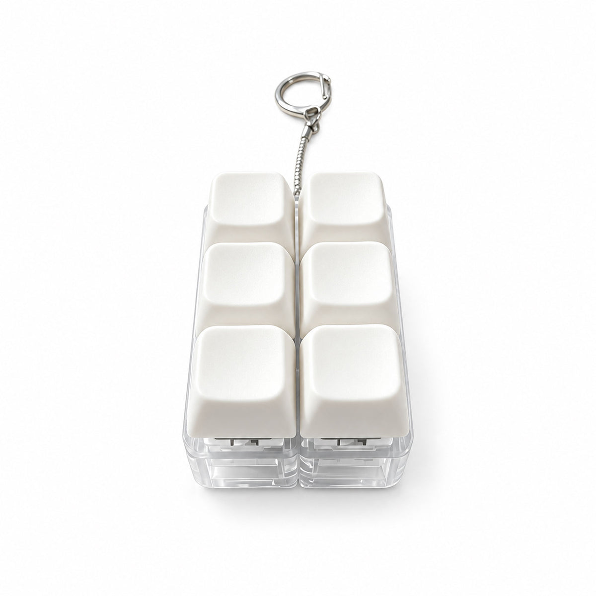 Crystal clear mechanical keyboard fidget clicker keychain on white backdrop