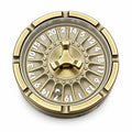 Antique gold metal roulette fidget spinner with numbered dial on studio view