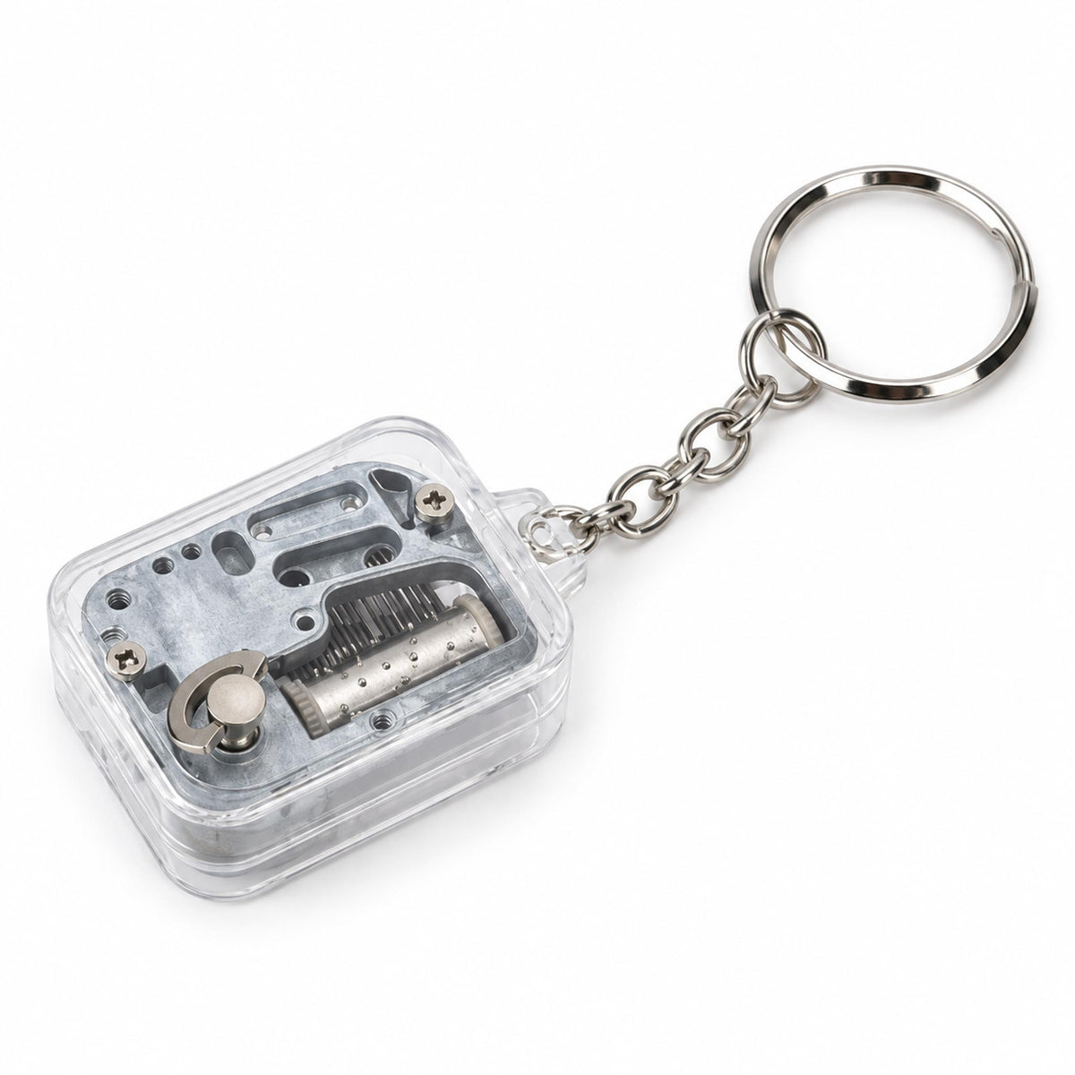Transparent hand-crank mini music box showing folding winding knob