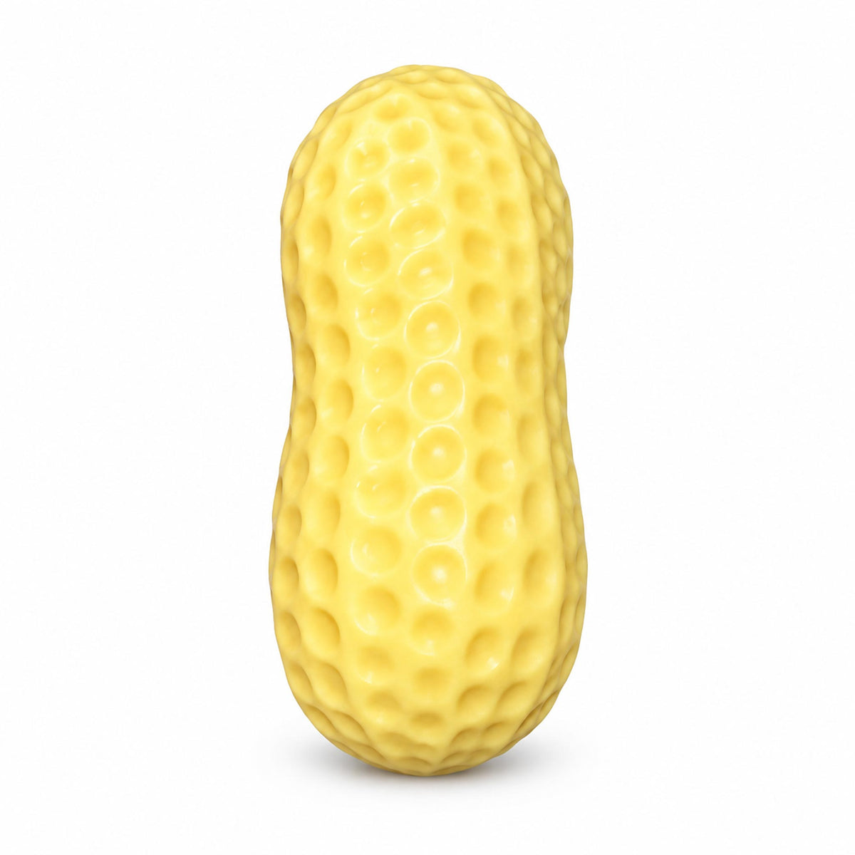 Yellow textured peanut squishy toy standing upright on studio background