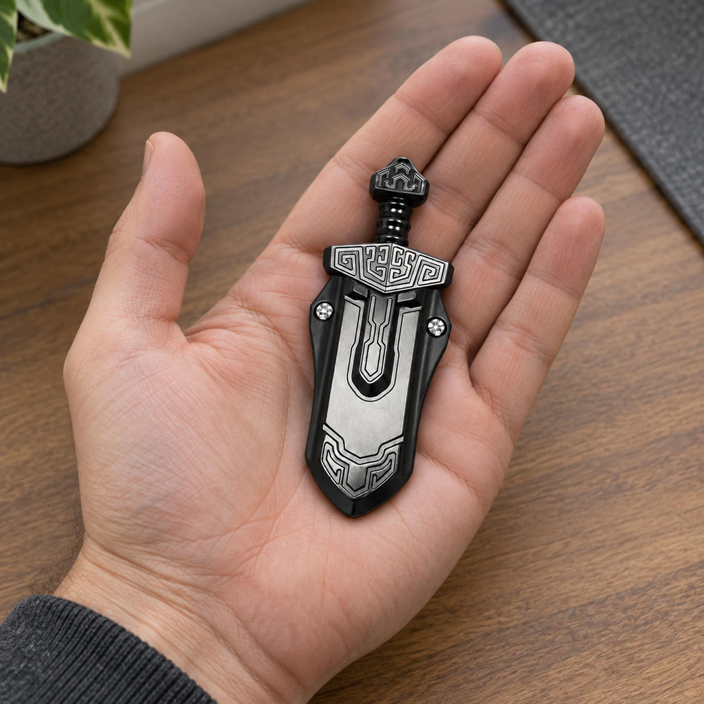 Black ancient totem mechanical fidget slider in hand on studio background