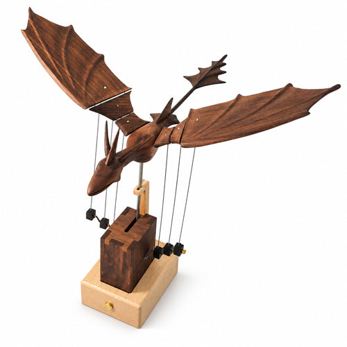 Chestnut wooden dragon automaton sculpture with wings raised on white background