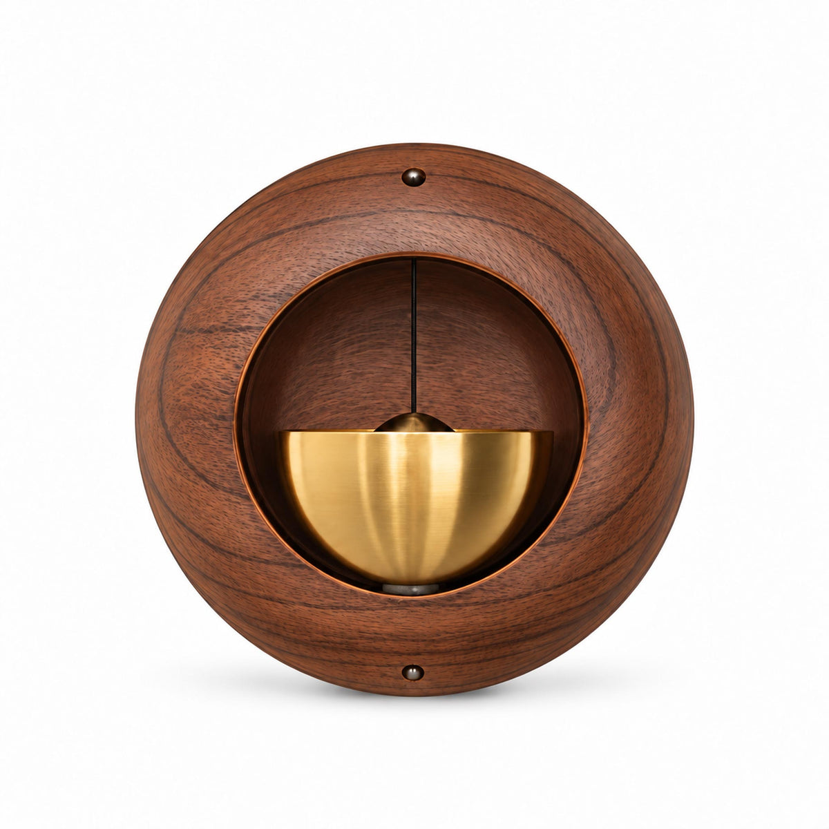 Close-up view of circular wooden zen chime showing suspended brass clapper