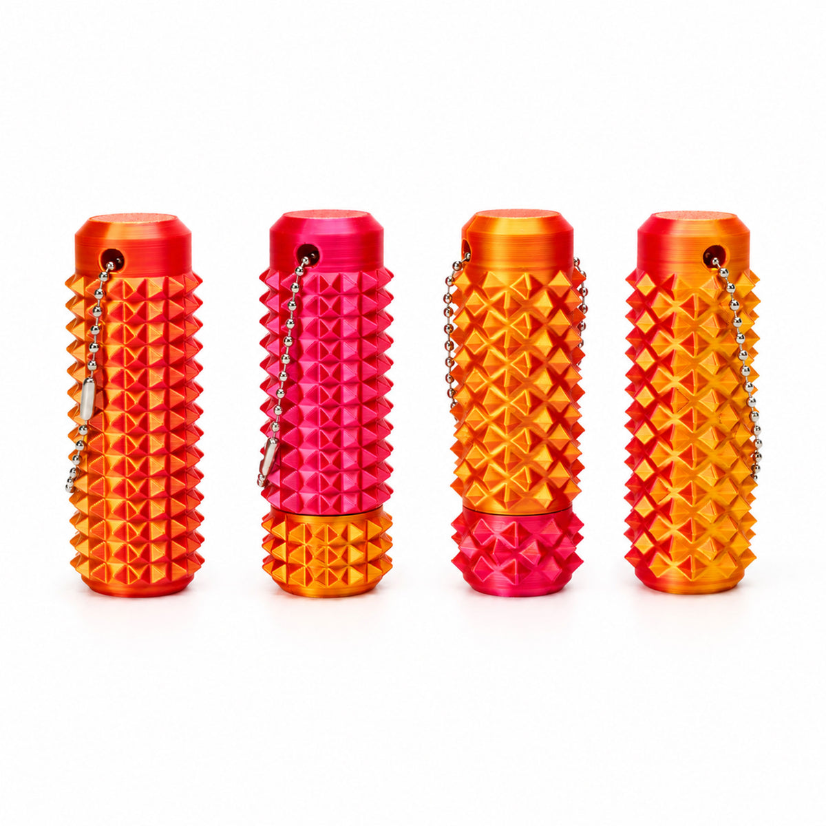 Sunset orange and red dual-tone spiky tactile massage roller on white